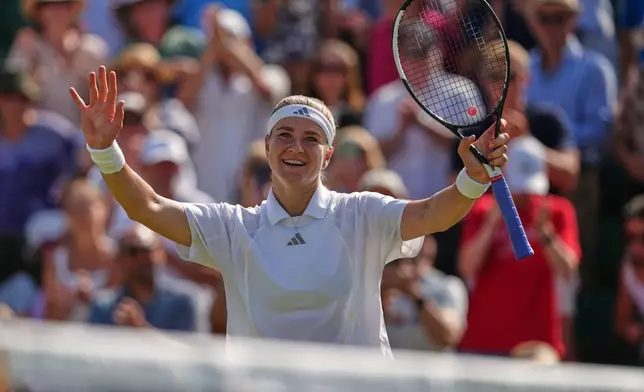 Karolina Muchova of the Czech Republic reacts during the women's singles fourth round match against Barbora Krejcikova of the Czech Republic at the Wimbledon Tennis Championships in London, Sunday, July 5, 2026.(AP Photo/Maja Smiejkowska)