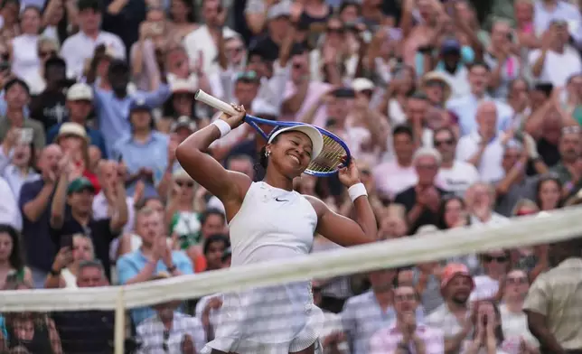 Naomi Osaka of Japan celebrates her victory against Aryna Sabalenka of Belarus in their fourth round women's singles match at the Wimbledon Tennis Championships in London, Sunday, July 5, 2026. (AP Photo/Brian Inganga)