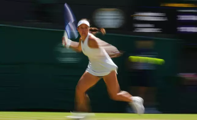 Jessica Pegula of the United States plays a return during the women's singles fourth round match against Iva Jovic of the United States at the Wimbledon Tennis Championships in London, Sunday, July 5, 2026.(AP Photo/Kin Cheung)
