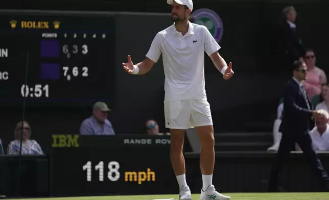 Novak Djokovic of Serbia reacts after losing a point to Roman Saffiulin of Russia in their fourth round men's singles match at the Wimbledon Tennis Championships in London, Sunday, July 5, 2026. (AP Photo/Brian Inganga)