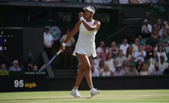 Naomi Osaka of Japan celebrates winning a point against Aryna Sabalenka of Belarus in their fourth round women's singles match at the Wimbledon Tennis Championships in London, Sunday, July 5, 2026. (AP Photo/Brian Inganga)