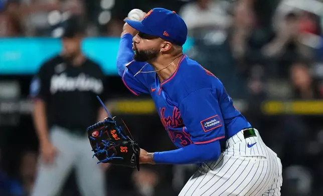 New York Mets' Devin Williams pitches during the ninth inning of a baseball game against the Miami Marlins Thursday, July 30, 2026, in New York. (AP Photo/Frank Franklin II)