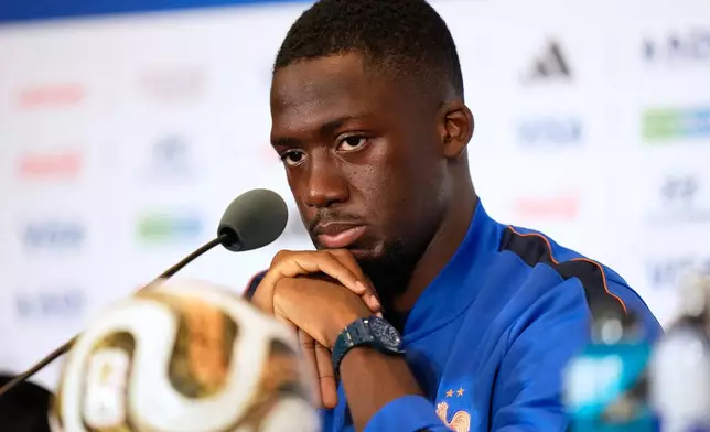 France's Ibrahima Konate listens during a news conference ahead of their third-place World Cup soccer match against England, in Miami Gardens, Fla., Friday, July 17, 2026. (AP Photo/Lynne Sladky)