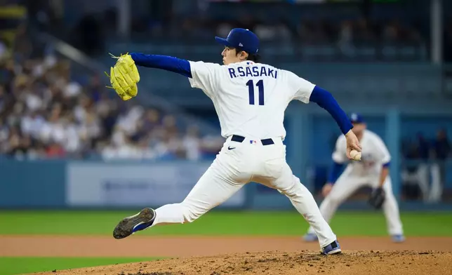 Los Angeles Dodgers starting pitcher Roki Sasaki delivers during the third inning of a baseball game against the San Diego Padres in Los Angeles, Thursday, July 2, 2026. (AP Photo/Kyusung Gong)