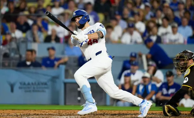 Los Angeles Dodgers' Andy Pages hits a two-run double during the fourth inning of a baseball game against the San Diego Padres in Los Angeles, Thursday, July 2, 2026. (AP Photo/Kyusung Gong)