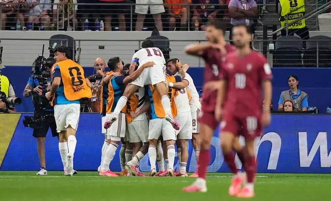 Spain celebrates their first goal during the World Cup round of 16 soccer match against Portugal in Arlington, Texas, near Dallas, Monday, July 6, 2026. (AP Photo/Ashley Landis)