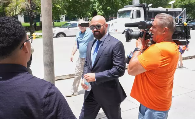 Attorney Joseph McBride arrives for a court hearing for his clients Andrew and Tristan Tate after they were arrested to face rape and sex trafficking charges against them in the United Kingdom, Monday, July 20, 2026, in Miami. (AP Photo/Marta Lavandier)