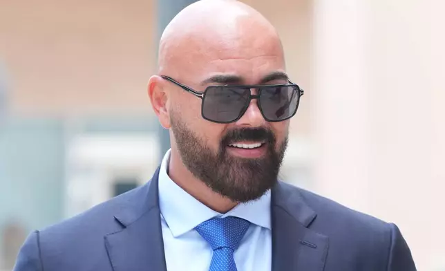 Attorney Joseph McBride arrives for a court hearing for his clients Andrew and Tristan Tate after they were arrested to face rape and sex trafficking charges against them in the United Kingdom, Monday, July 20, 2026, in Miami. (AP Photo/Marta Lavandier)
