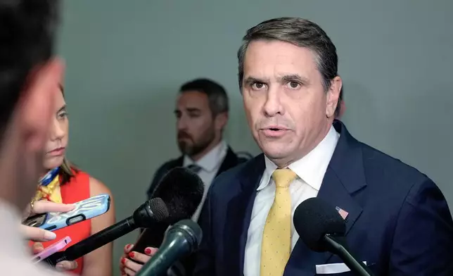 Acting Attorney General Todd Blanche talks with reporters after attending a meeting related to survivors of convicted sex offender Jeffrey Epstein, in Washington, Thursday, July 16, 2026. (AP Photo/Mariam Zuhaib)
