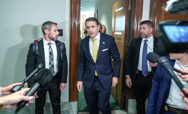 Acting Attorney General Todd Blanche walks to speak with reporters after attending a meeting related to survivors of convicted sex offender Jeffrey Epstein, in Washington, Thursday, July 16, 2026. (AP Photo/Mariam Zuhaib)