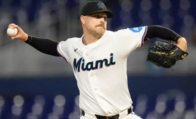 Miami Marlins starting pitcher Janson Junk throws during the first inning of a baseball game against the Seattle Mariners, Thursday, July 9, 2026, in Miami. (AP Photo/Lynne Sladky)