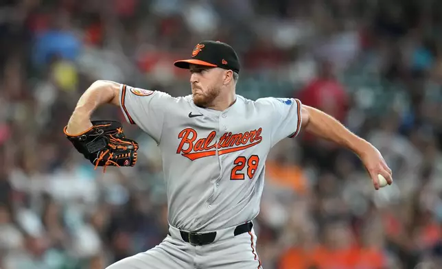 Baltimore Orioles starting pitcher Trevor Rogers delivers to Houston Astros' Isaac Paredes during the first inning of a baseball game, Saturday, July 18, 2026, in Houston. (AP Photo/Karen Warren)