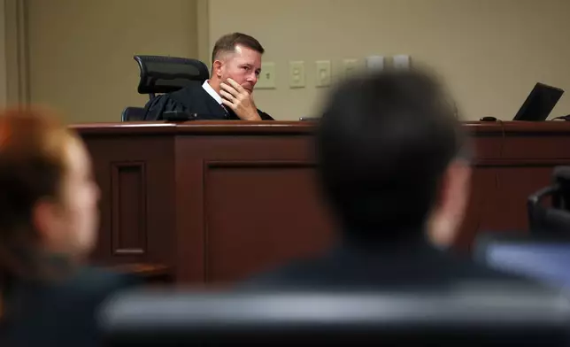 Judge Nicholas Primm reacts during the sentencing for Colt Gray, right, the 16-year-old Apalachee High School shooting suspect, at Barrow County Superior Court, Monday, July 27, 2026, in Winder, Ga. (Jason Getz/Atlanta Journal-Constitution via AP)