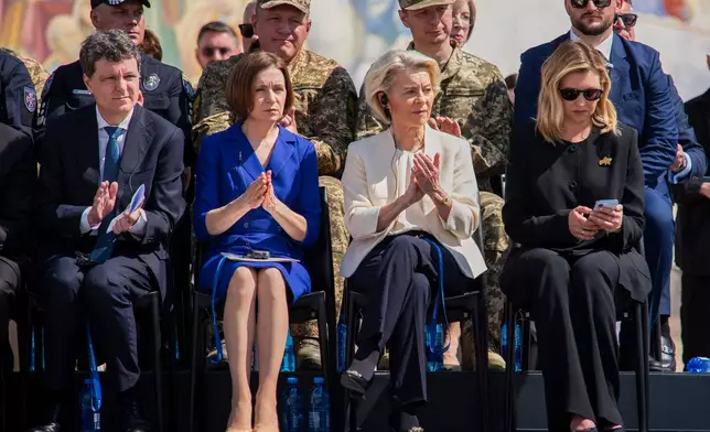 From left, Romania President Nicusor Dan, Moldova President Maia Sandu, European Commission President Ursula von der Leyen and Olena Zelenska attend a ceremony in Kyiv, Ukraine, Wednesday, July 15, 2026. (AP Photo/Dan Bashakov)