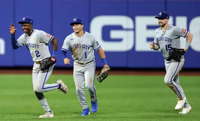 Kansas City Royals' Tyler Tolbert (2) celebrates with Isaac Collins (1) and Lane Thomas (15) after defeating the New York Mets in a baseball game Tuesday, July 7, 2026, in New York. (AP Photo/Adam Hunger)