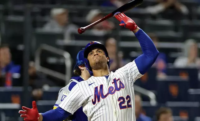 New York Mets' Juan Soto reacts to flying out during the eighth inning of a baseball game against the Kansas City Royals, Tuesday, July 7, 2026, in New York. (AP Photo/Adam Hunger)