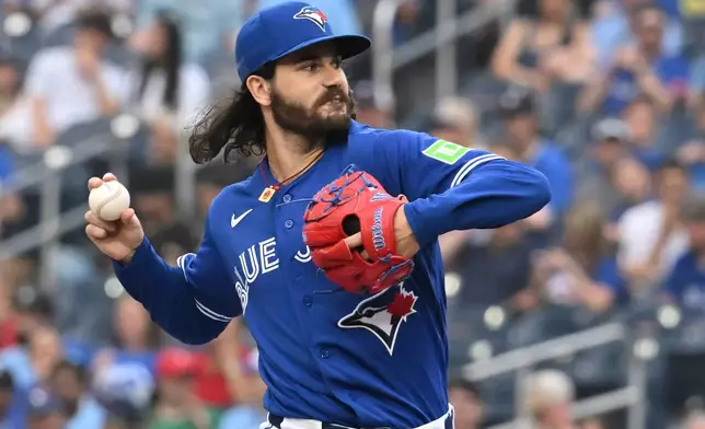Toronto Blue Jays pitcher Dylan Cease throws to a Tampa Bay Rays batter during the first inning of a baseball game in Toronto, Monday, July 20, 2026. (Jon Blacker/The Canadian Press via AP)