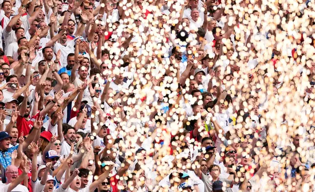 Fans of England cheer prior to the World Cup quarterfinal soccer match between Norway and England in Miami Gardens, Fla., Saturday, July 11, 2026. (AP Photo/Chris Carlson)