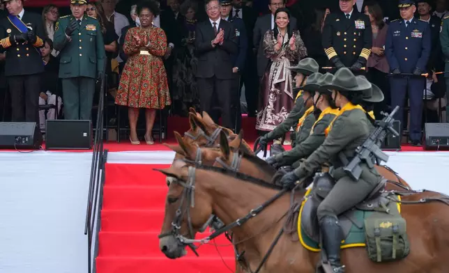 President Gustavo Petro, center, and Vice President Francia Marquez, third from left, attend a military parade marking Colombia's Independence Day in Bogota, Colombia, Monday, July 20, 2026. (AP Photo/Fernando Vergara)