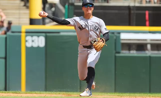 New York Yankees' Anthony Volpe throws to first base to get Chicago White Sox' Braden Montgomery out during the second inning of a baseball game, Thursday, July 30, 2026, in Chicago. (AP Photo/Melissa Tamez)