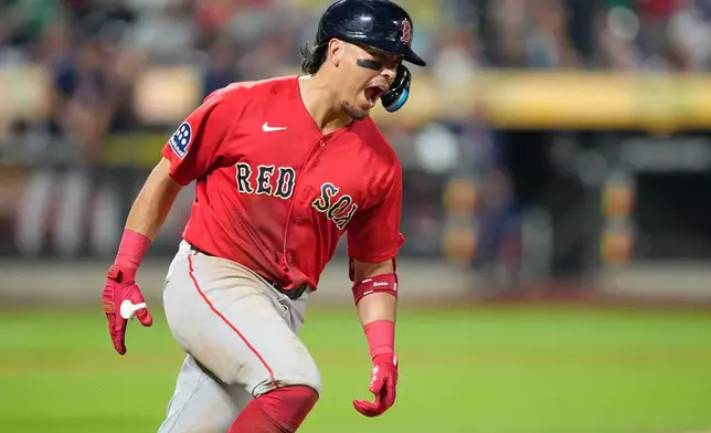 Boston Red Sox's Anthony Seigler celebrates after hitting a two-run home run during the seventh inning of a baseball game against the New York Mets Friday, July 10, 2026, in New York. (AP Photo/Frank Franklin II)