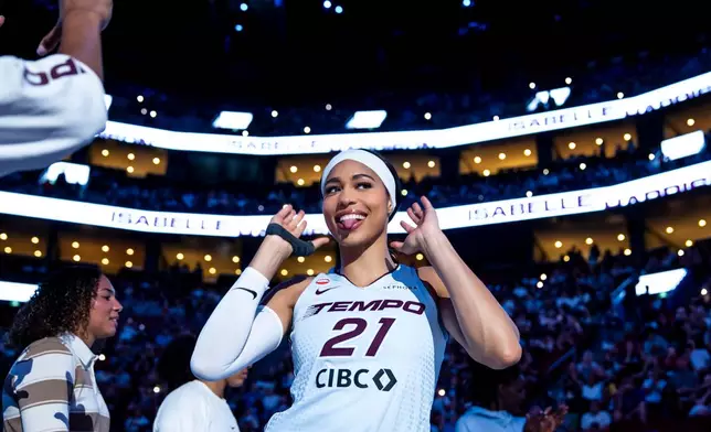 Toronto Tempo's Isabelle Harrison (21) gestures before of a WNBA basketball game against the Dallas Wings in Montreal, Friday, July 10, 2026. (Christopher Katsarov/The Canadian Press via AP)