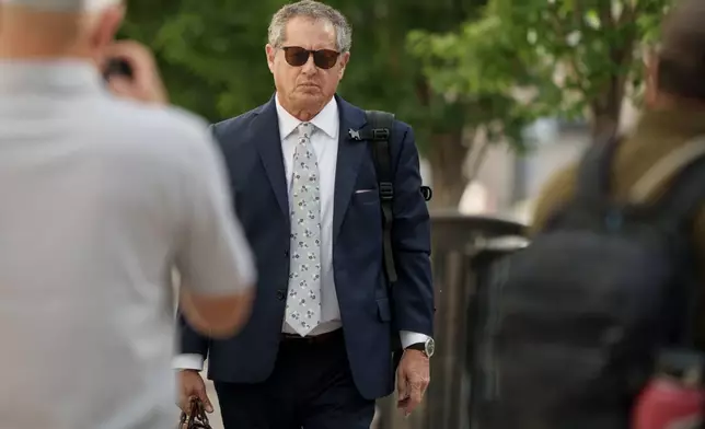 Attorney Richard Novak, part of the defense team for Tyler Robinson, accused in the fatal shooting of Charlie Kirk, arrives at the Fourth District Courthouse in Provo, Utah for his client's hearing, Tuesday, July 7, 2026. (AP Photo/Spenser Heaps)