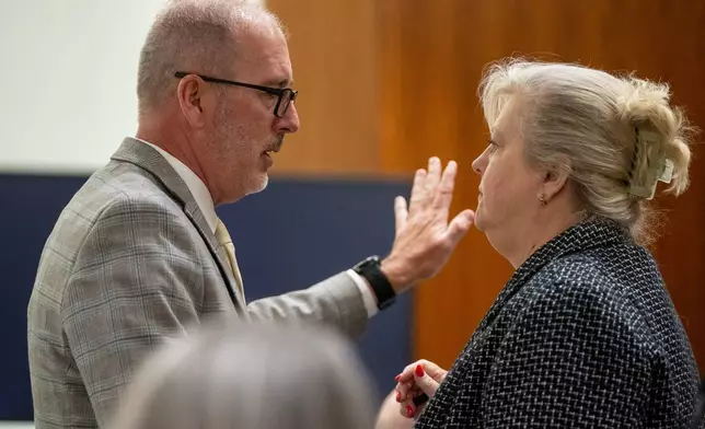 Utah County Attorney's Office prosecutor David Sturgill, left, exchanges looks with defense attorney Kathryn Nester during a preliminary hearing in Fourth District Court for Tyler Robinson, who is accused of fatally shooting Charlie Kirk, in Provo, Utah, on Tuesday, July 7, 2026. (Trent Nelson/The Salt Lake Tribune via AP, Pool)