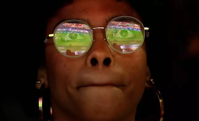A Brazil soccer fan watches Brazil's World Cup match against Norway on a screen on Copacabana beach in Rio de Janeiro, Brazil, Sunday, July 5, 2026. (AP Photo/Bruna Prado)