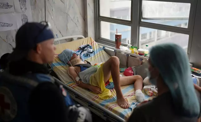 Fabricio Gutierrez, 16, recovers at Perez Carreno Hospital in Caracas, Venezuela, after his foot was amputated because of injuries he suffered when the apartment building where he lived in La Guaira collapsed during the earthquake, Saturday, July 4, 2026. (AP Photo/Matias Delacroix)