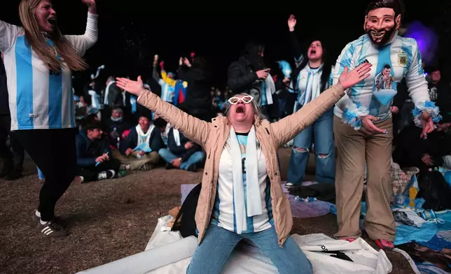 Fans watch the World Cup round of 32 soccer match between Argentina and Cape Verde in Buenos Aires, Argentina, Friday, July 3, 2026. (AP Photo/Rodrigo Abd)