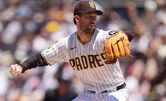 San Diego Padres pitcher Griffin Canning works against a Colorado Rockies batter during the third inning of a baseball game Wednesday, July 29, 2026, in San Diego. (AP Photo/Gregory Bull)