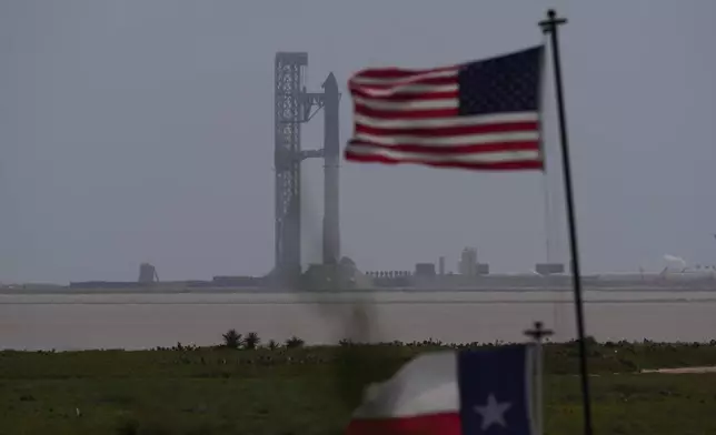 SpaceX's mega rocket Starship stands ready but was aborted before liftoff, in Starbase, Texas, Thursday, July 16, 2026. (AP Photo/Eric Gay)
