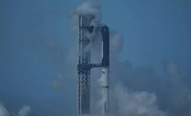 SpaceX's mega rocket Starship stands ready but was aborted before liftoff, in Starbase, Texas, Thursday, July 16, 2026. (AP Photo/Eric Gay)