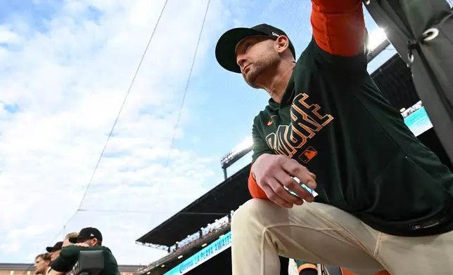 Baltimore Orioles manager Craig Albernaz, right, looks on from the dugout during a baseball game against the Atlanta Braves, Friday, July 24, 2026, in Baltimore. (AP Photo/Terrance Williams)