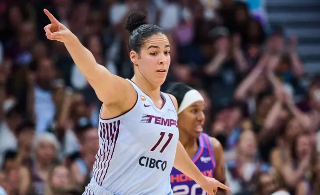 Toronto Tempo's Kia Nurse (11) celebrates after scoring against the Phoenix Mercury during first half of an WNBA basketball game in Toronto, on Saturday, June 27, 2026. (Sammy Kogan /The Canadian Press via AP)