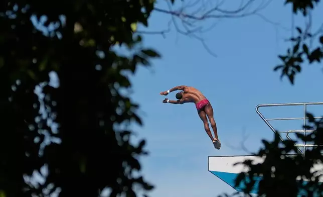 Dominican Republic's Symbol Sanchez competes in the men's platform preliminary diving event at the Central American and Caribbean Games in Santo Domingo, Dominican Republic, Wednesday, July 29, 2026. (AP Photo/Fernando Vergara)