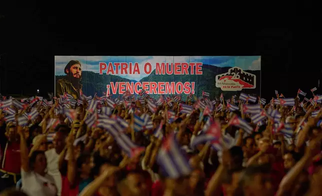 A billboard depicting the late leader Fidel Castro and reading "Homeland or death, we will defeat!" is seen during an event marking the 73th anniversary of the start of the Cuban Revolution in Pinar del Rio, Cuba, Sunday, July 26, 2026. (AP Photo/Ramon Espinosa)