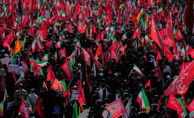 Mourners attend the funeral procession of the late Iranian Supreme Leader Ayatollah Ali Khamenei in Tehran, Iran, Monday, July 6, 2026. (AP Photo/Vahid Salemi)