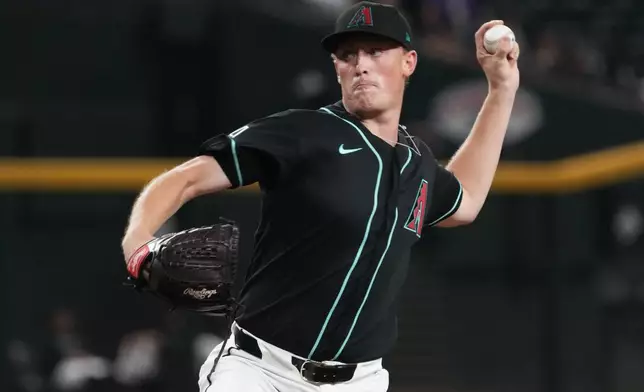 Arizona Diamondbacks pitcher Kohl Drake throws against the Athletics in the first inning of a baseball game, Tuesday, July 21, 2026, in Phoenix. (AP Photo/Rick Scuteri)