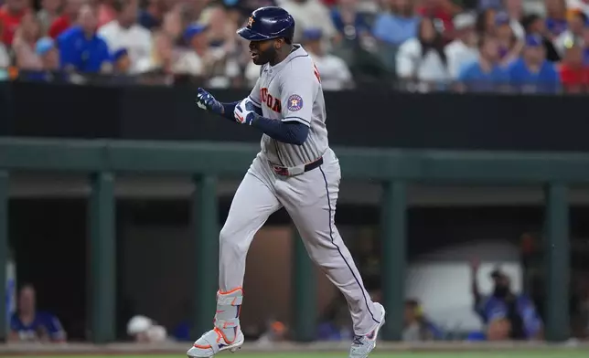Houston Astros' Yordan Alvarez rounds third base after hitting a home run during the sixth inning of a baseball game against the Texas Rangers, Friday, July 10, 2026, in Arlington, Texas. (AP Photo/LM Otero)