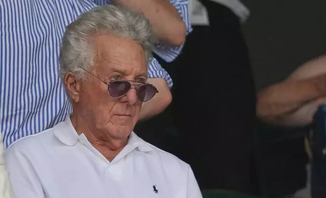 Actor Dustin Hoffman watches a Alexander Zverev of Germany defeats Arthur Fery of Britain during their men's singles semifinal match at the Wimbledon Tennis Championships in London, Friday, July 10, 2026. (AP Photo/Kirsty Wigglesworth)