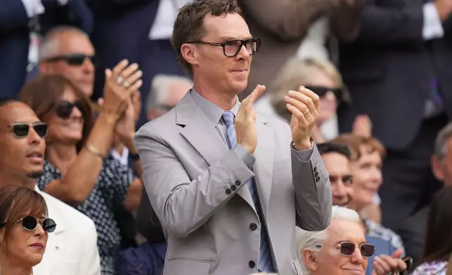Actor Benedict Cumberbatch applauds as he watches the men's singles semifinal matches from the Royal Box on Center Court at the Wimbledon Tennis Championships in London, Friday, July 10, 2026. (AP Photo/Kirsty Wigglesworth)