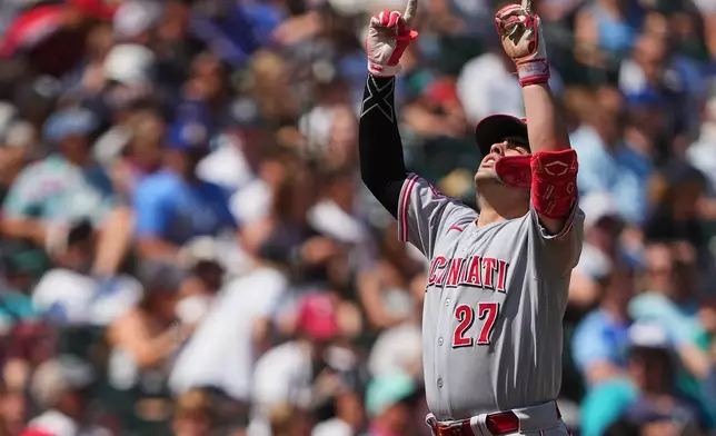 Cincinnati Reds' Sal Stewart reacts while running the bases after hitting a three-run home run against the Seattle Mariners during the seventh inning of a baseball game, Wednesday, July 22, 2026, in Seattle. (AP Photo/Lindsey Wasson)