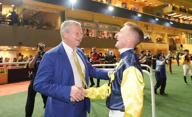 The Hong Kong Jockey Club’s Chief Executive Officer, Winfried Engelbrecht-Bresges, joins jockeys in celebrating the 2025/26 Season Finale at Happy Valley. Photo source: HKJC