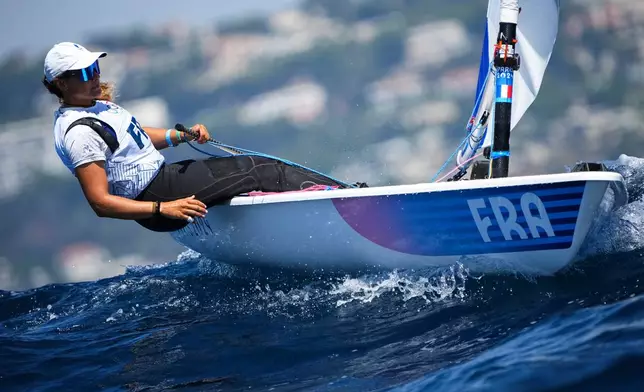 FILE - Louise Cervera of France practices before the start of the women's dinghy race during the 2024 Summer Olympics, Aug. 4, 2024, in Marseille, France. (AP Photo/Daniel Cole, File)