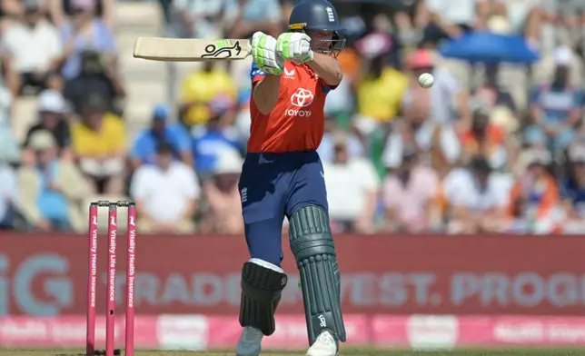 England's Jos Butler plays a shot during the international T20 Cricket match between England and India In Southampton, England, Saturday, July 11, 2026. (AP Photo/Anthony Upton)