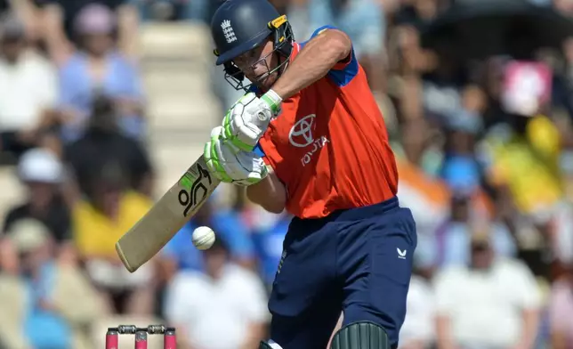 England's Jos Buttler plays a shot during the T20 international cricket match between England and India in Southampton, England, Saturday July 11, 2026. (AP Photo/Anthony Upton)