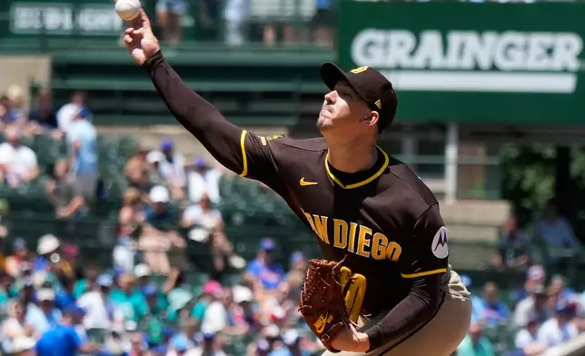 San Diego Padres starting pitcher Walker Buehler throws against the Chicago Cubs during the first inning of a baseball game in Chicago, Wednesday, July 1, 2026. (AP Photo/Nam Y. Huh)