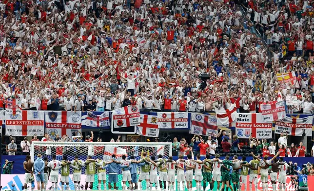 England's players celebrate with fans at the end of the World Cup round of 32 soccer match between England and Congo in Atlanta, Wednesday, July 1, 2026. (AP Photo/Erik S. Lesser)